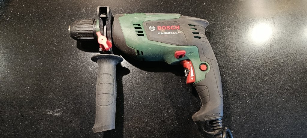 Bosch universal impact 800 boor/boorklopmachine, Boormachine, Ophalen of Verzenden, Variabele snelheid, Gebruikt
