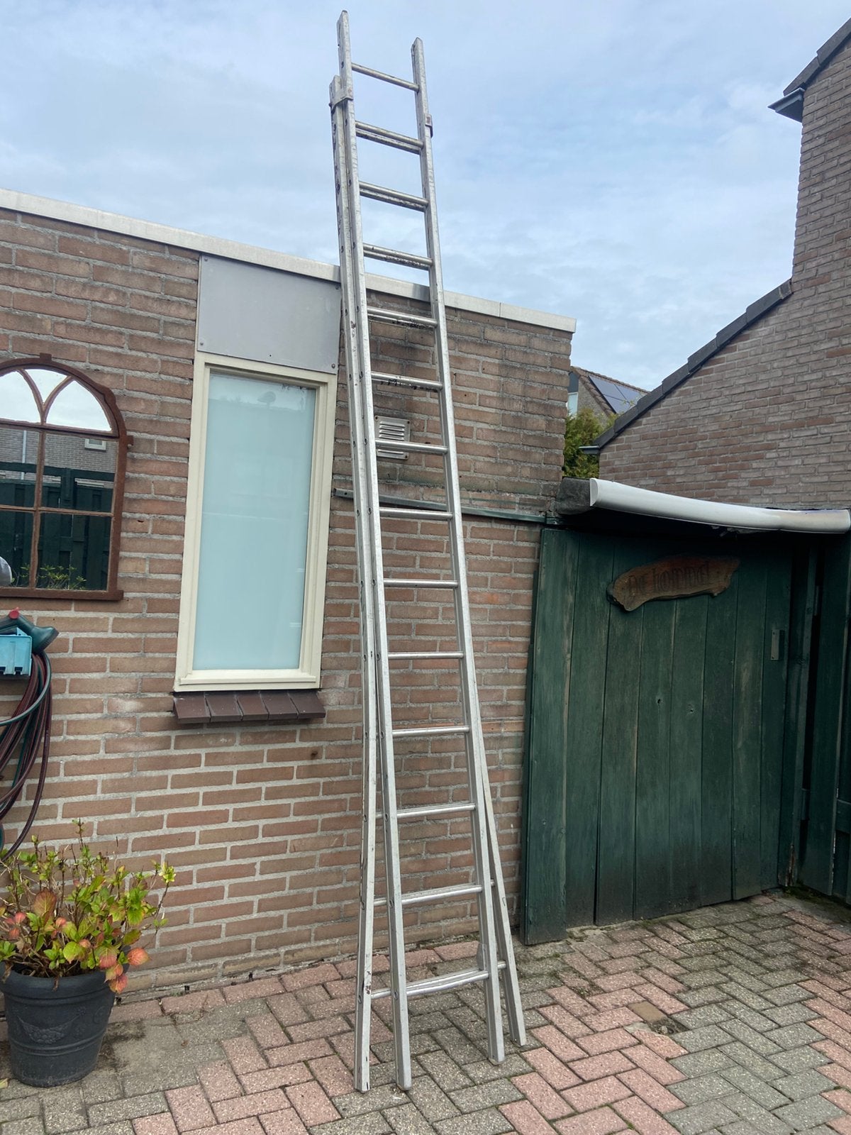 Prima schuifladder 2x14 sporten., Ophalen, Zo goed als nieuw, 4 meter of meer