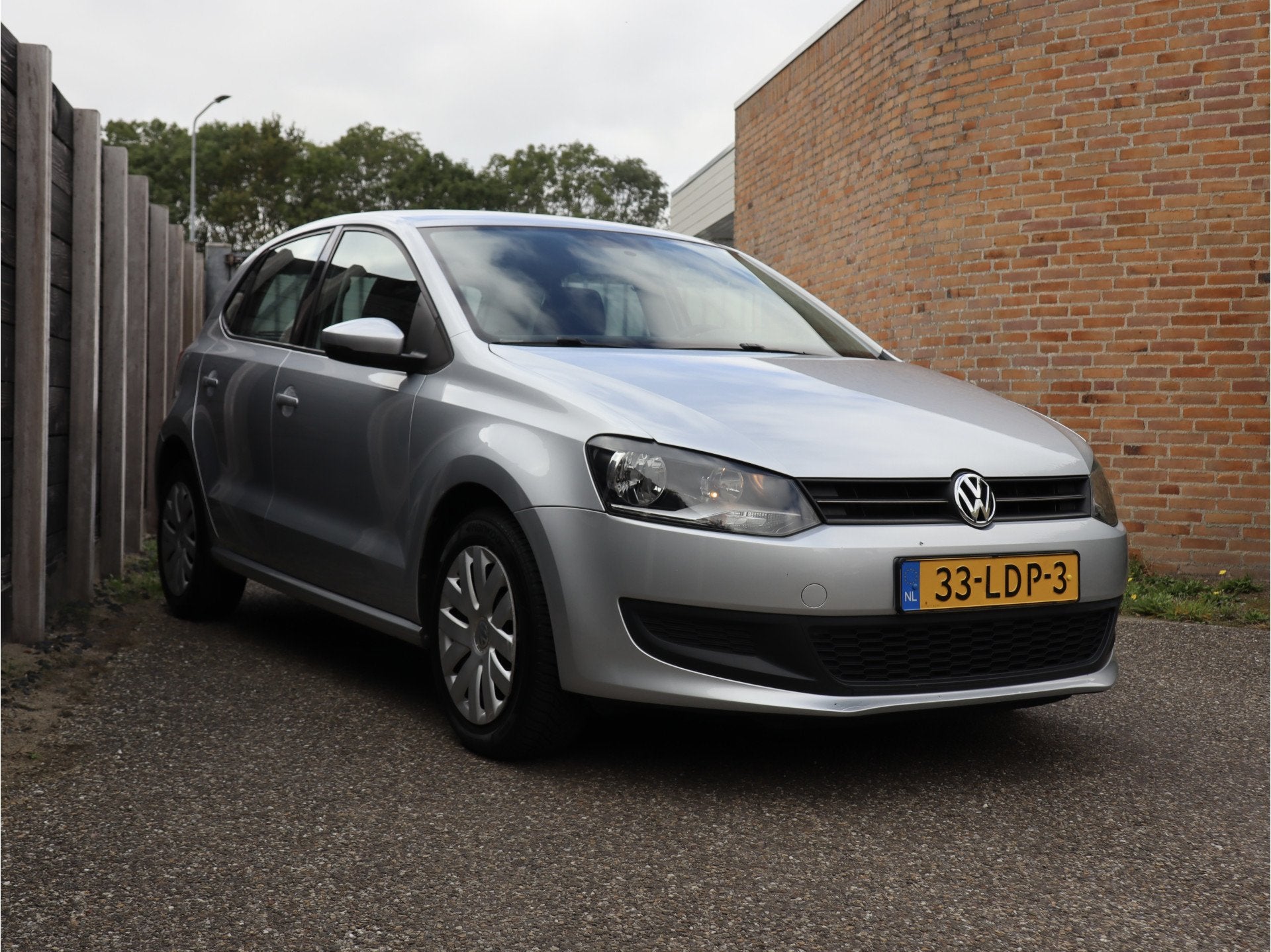 Volkswagen Polo 1.4-16V Comfortline NL-auto (bj 2010), Voorwielaandrijving, Zwart, 4 cilinders, Origineel Nederlands