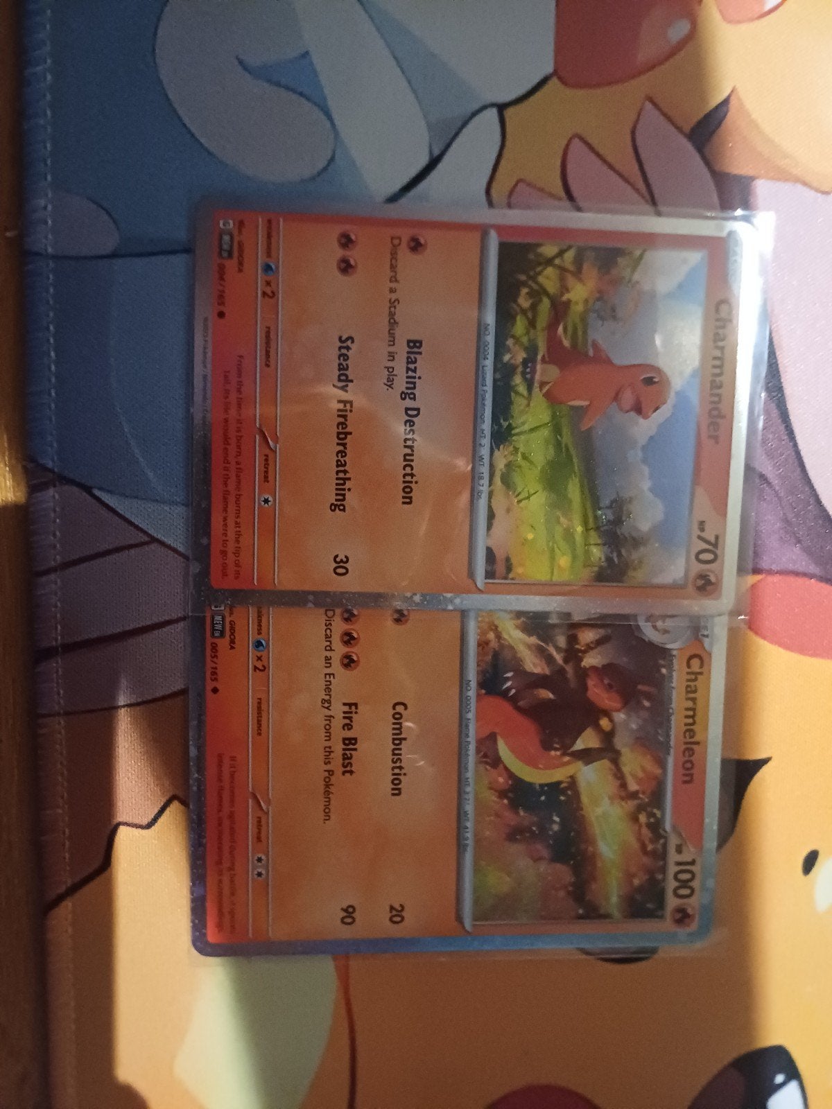 Charmander en Charmeleon cosmos holos, Ophalen of Verzenden, Gebruikt, Meerdere kaarten
