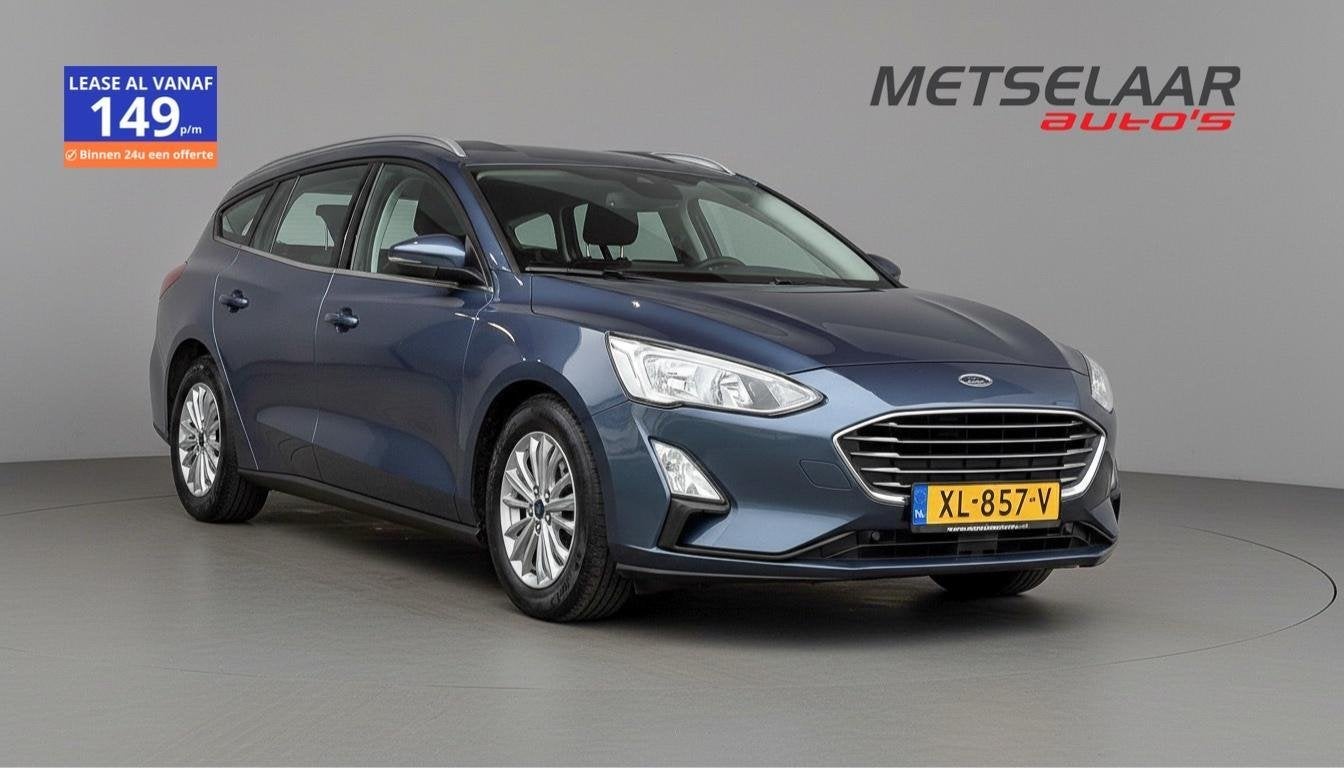 Ford Focus Wagon 1.0 EcoBoost Titanium Business, Auto's, Gebruikt, Blauw, 3 cilinders, Onderhoudsboekje