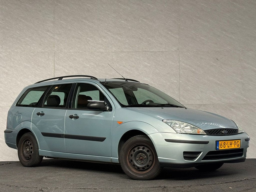 Ford Focus Wagon 1.4-16V Cool Edition - Airco - Leder - NAP, Auto's, 15 km/l, Gebruikt, 4 cilinders, Origineel Nederlands
