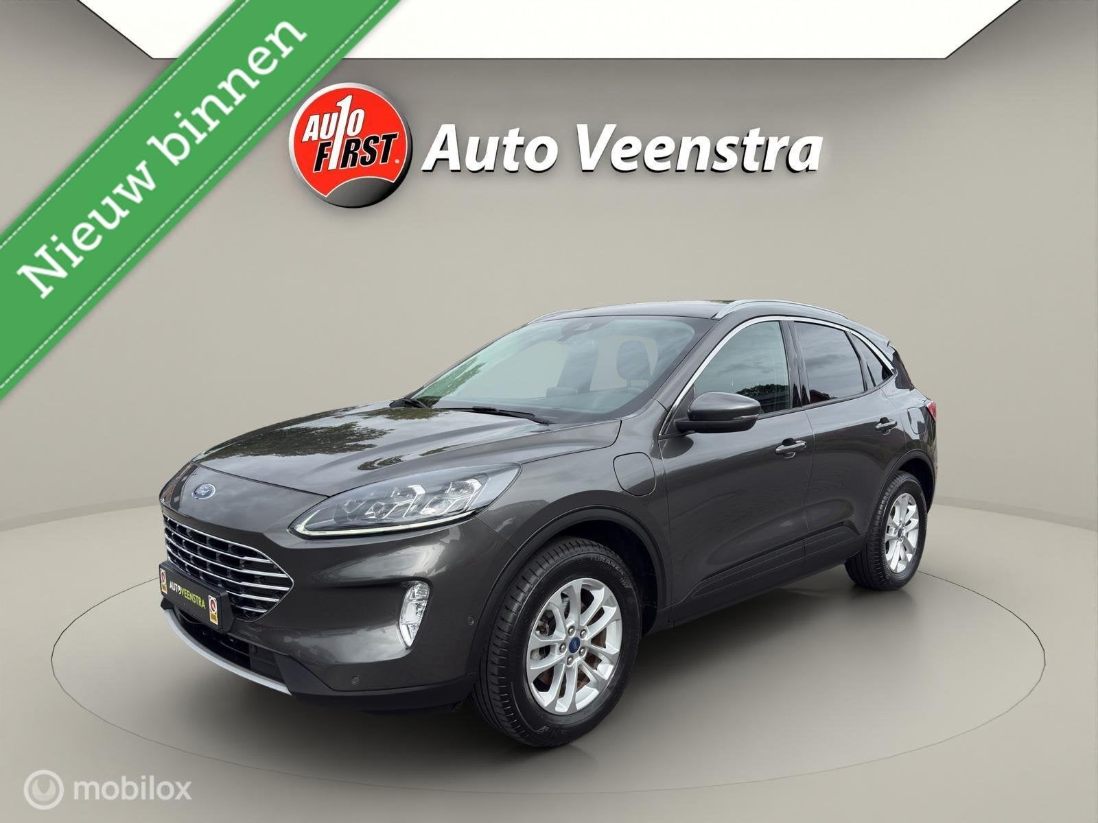 Ford Kuga 2.5 PHEV Titanium X|CAM|STOEL/STUURVERW|B&O|ADAPTI, Auto's, Gebruikt, Zwart, 4 cilinders, Met garantie (alle)
