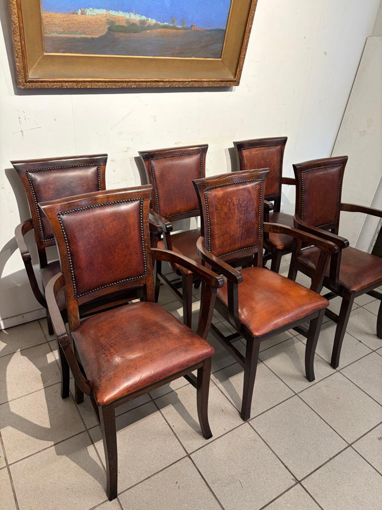 6 schapenleren armstoelen met donker hout, Ophalen