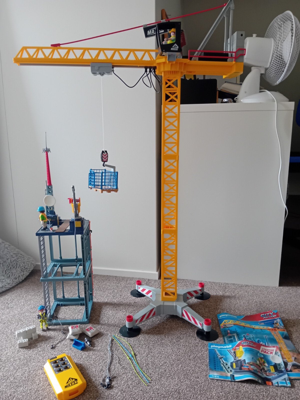 Playmobil City Action Kraan met afstandsbediening, Ophalen