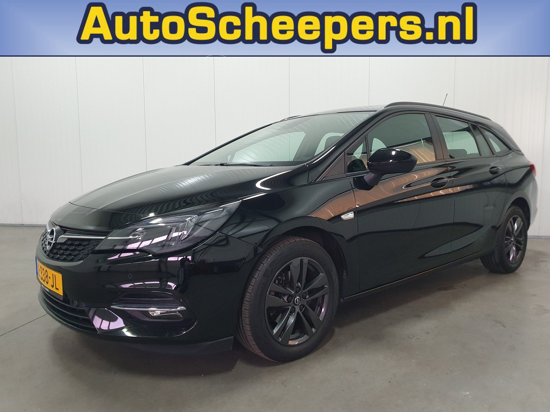 Opel Astra Sports Tourer 1.2 Edition NAVI/PDC/CRUISE/AIRCO/L, Auto's, Voorwielaandrijving, Stof, Euro 6, 1199 cc