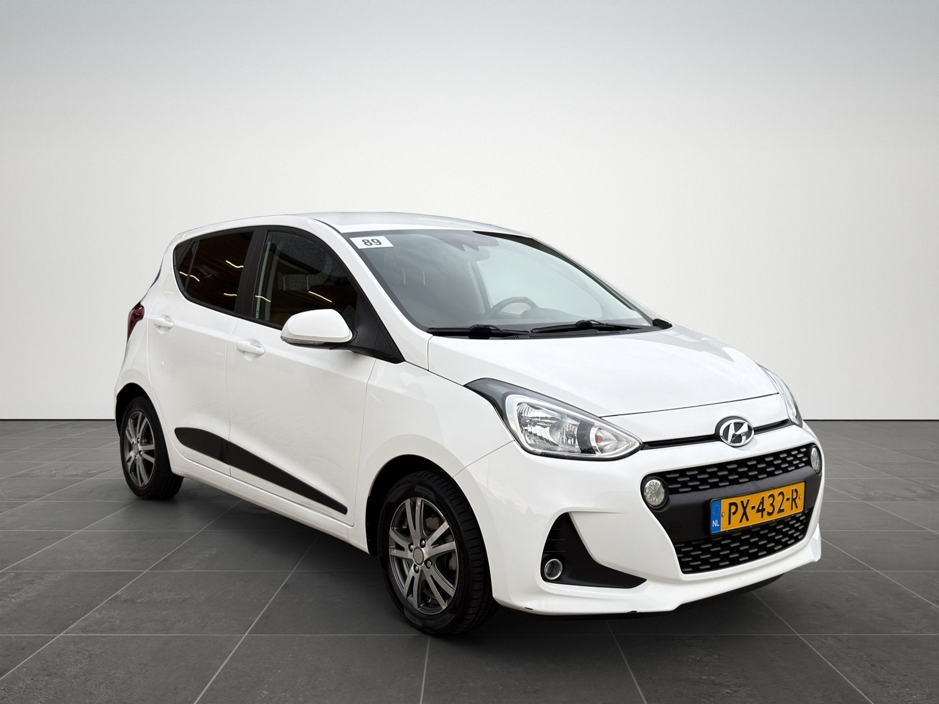Hyundai I10 1.0i i-Premium Airco|Cruise|Stuur&Stoelverwarmin, Auto's, Hyundai, Voorwielaandrijving, 4 stoelen, Wit, Origineel Nederlands