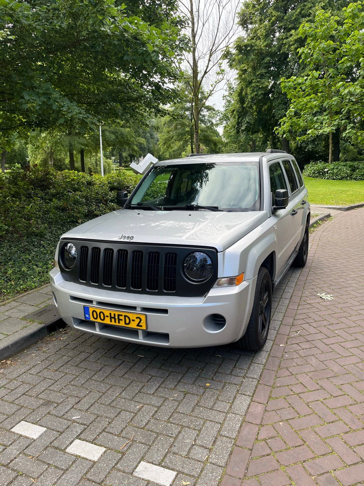 Jeep Patriot 2.4 2008 Grijs (Original NL), Auto's, 450 kg, 4 cilinders, 1465 kg, 75 €/maand