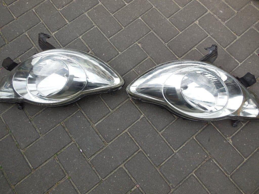 Peugeot 107 H4 koplampen set links + rechts – goede staat, Auto-onderdelen, Verlichting, Ophalen of Verzenden, Gebruikt, Peugeot