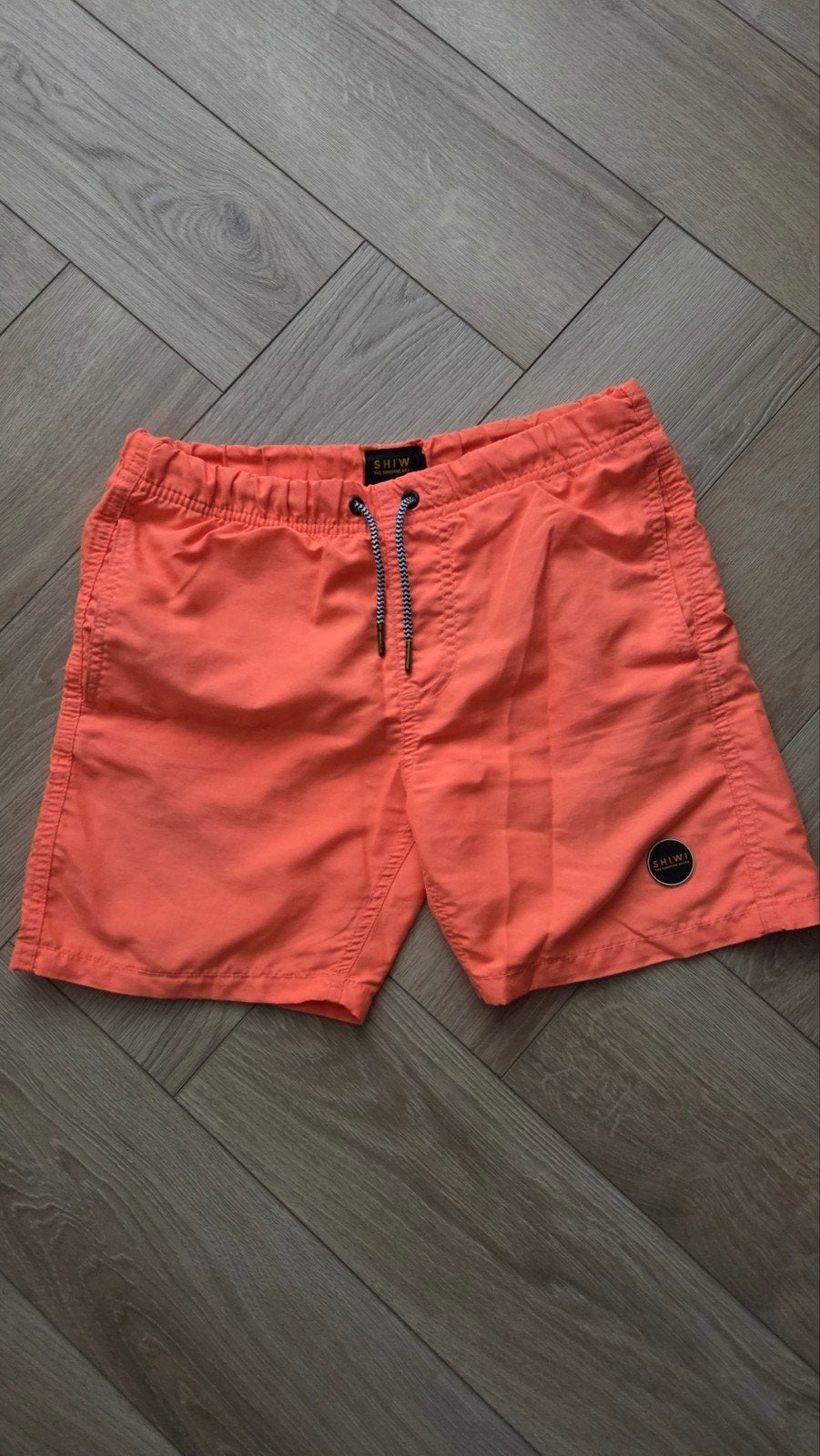 Oranje Shiwi zwemshort - Maat 152, Kinderen en Baby's, Ophalen of Verzenden, Zo goed als nieuw, Zwembroek, Jongen