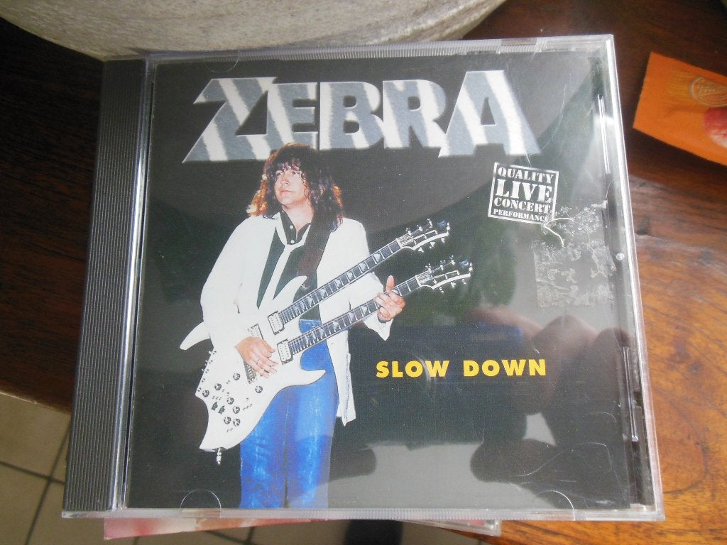 cd rock blues metal pop muziek zebra slow down, Ophalen of Verzenden, Zo goed als nieuw, Poprock, Overige typen