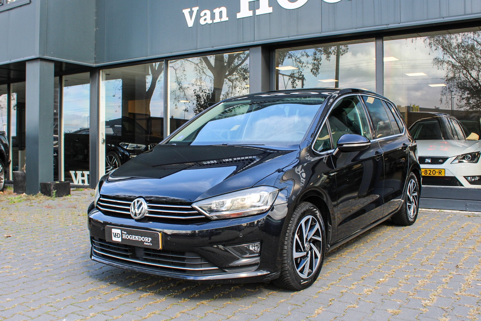 Volkswagen Golf Sportsvan 1.4 TSI Highline NAVI XENON CAMERA, Auto's, Gebruikt, Zwart, Golf Sportsvan, 19 km/l