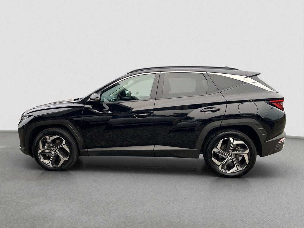 Hyundai TUCSON 1.6 T-GDI 265pk PHEV Premium 4WD, Auto's, Gebruikt, Zwart, Bedrijf, Vierwielaandrijving