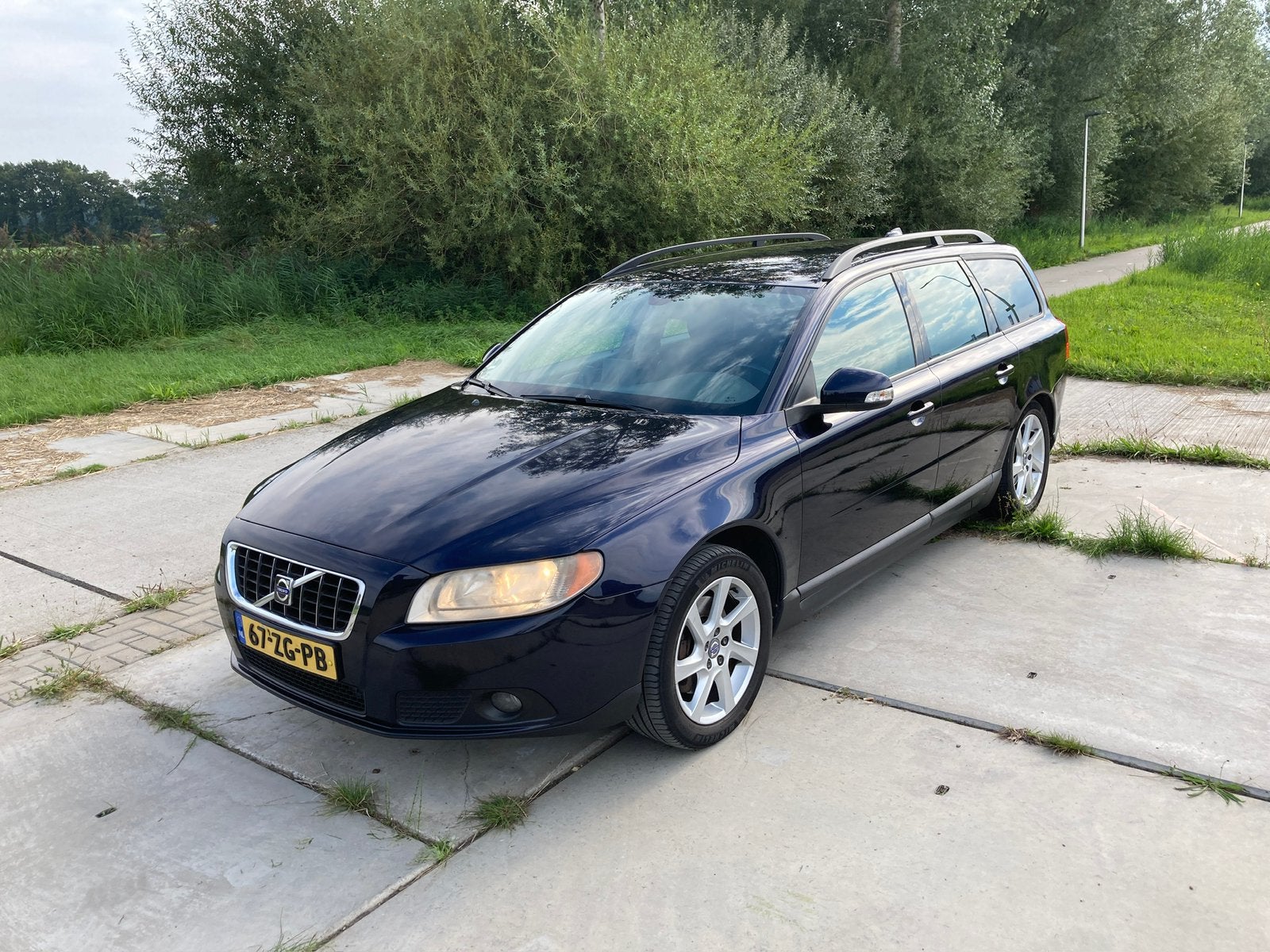 Volvo V70 2.4 D5 136KW AUT 2008 Blauw, Auto's, Stof, 1800 kg, Zwart, Blauw
