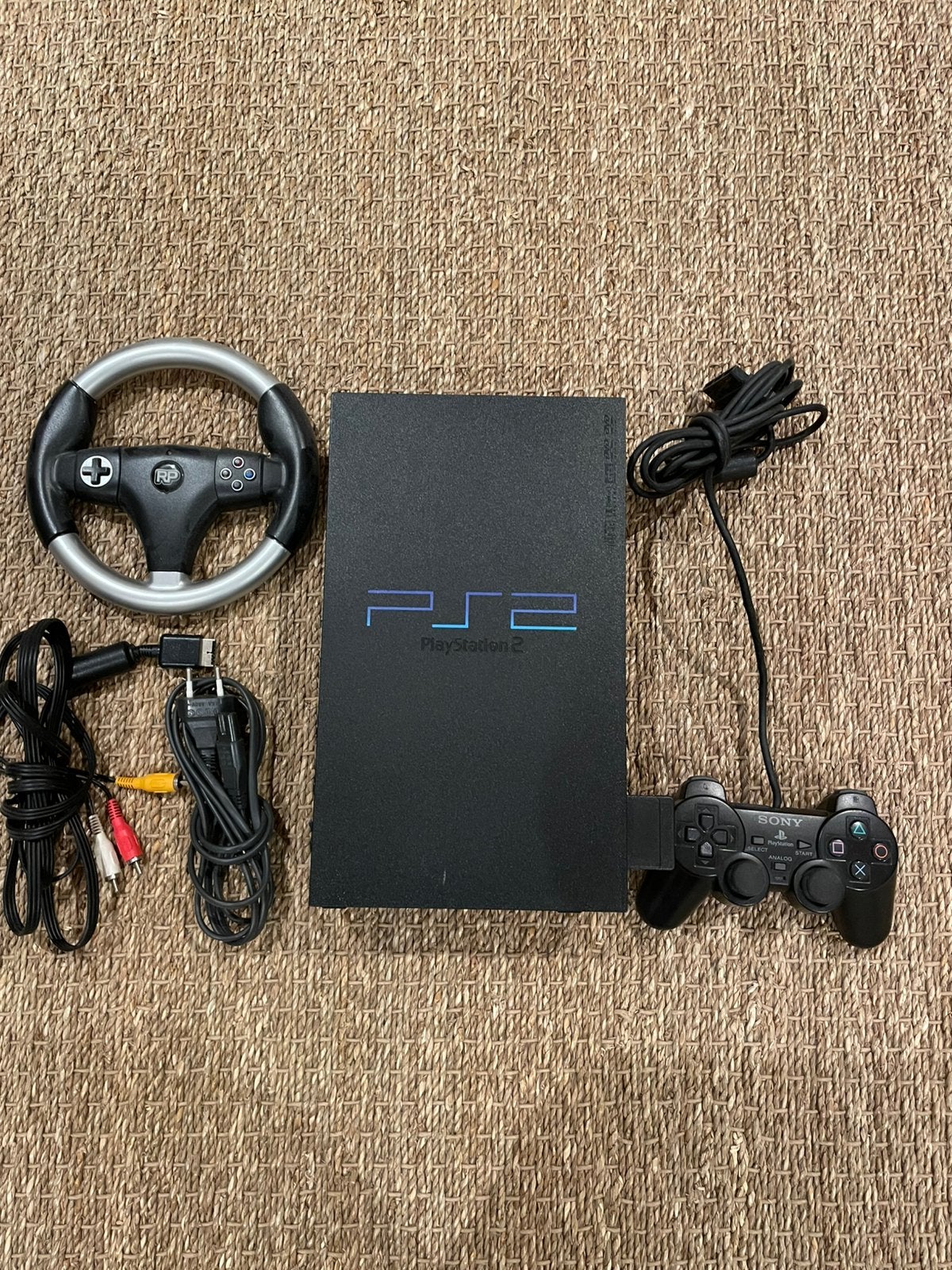 Werkende playstation 2 met games en stuur, Zwart, Met games, Ophalen of Verzenden, Zo goed als nieuw