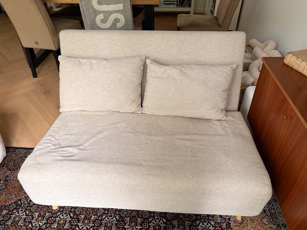 Slaapbank bank Sklum zand, Ophalen, 140 cm, Zo goed als nieuw, Twijfelaar