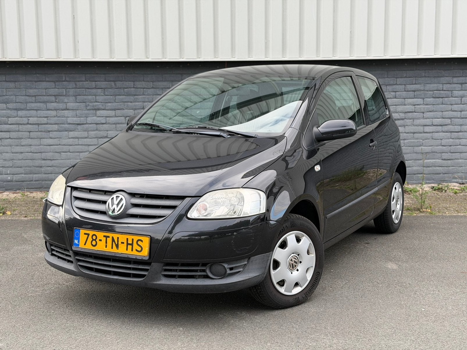 Volkswagen Fox 1.2 Handbak | Airco | Dealer onderhouden |, Voorwielaandrijving, Stof, Zwart, 4 stoelen