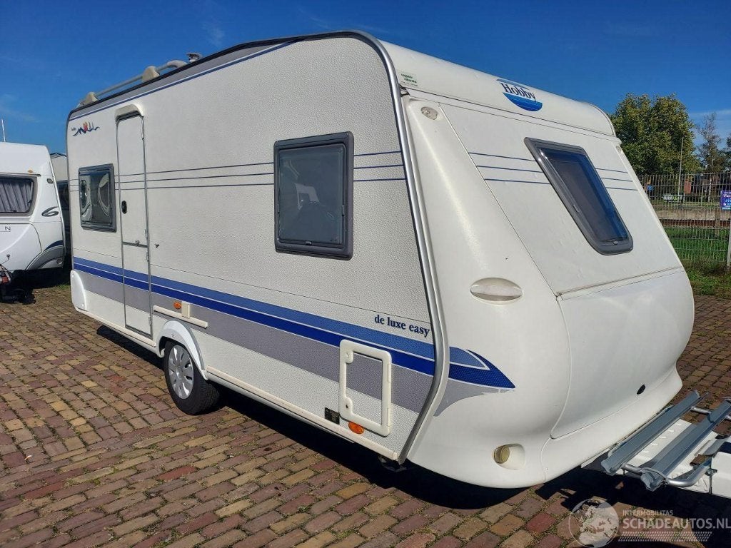 Hobby 460 UFE bj 2003 hagel dak 5950 euro, Vast bed, Rondzit, Hobby, Bedrijf