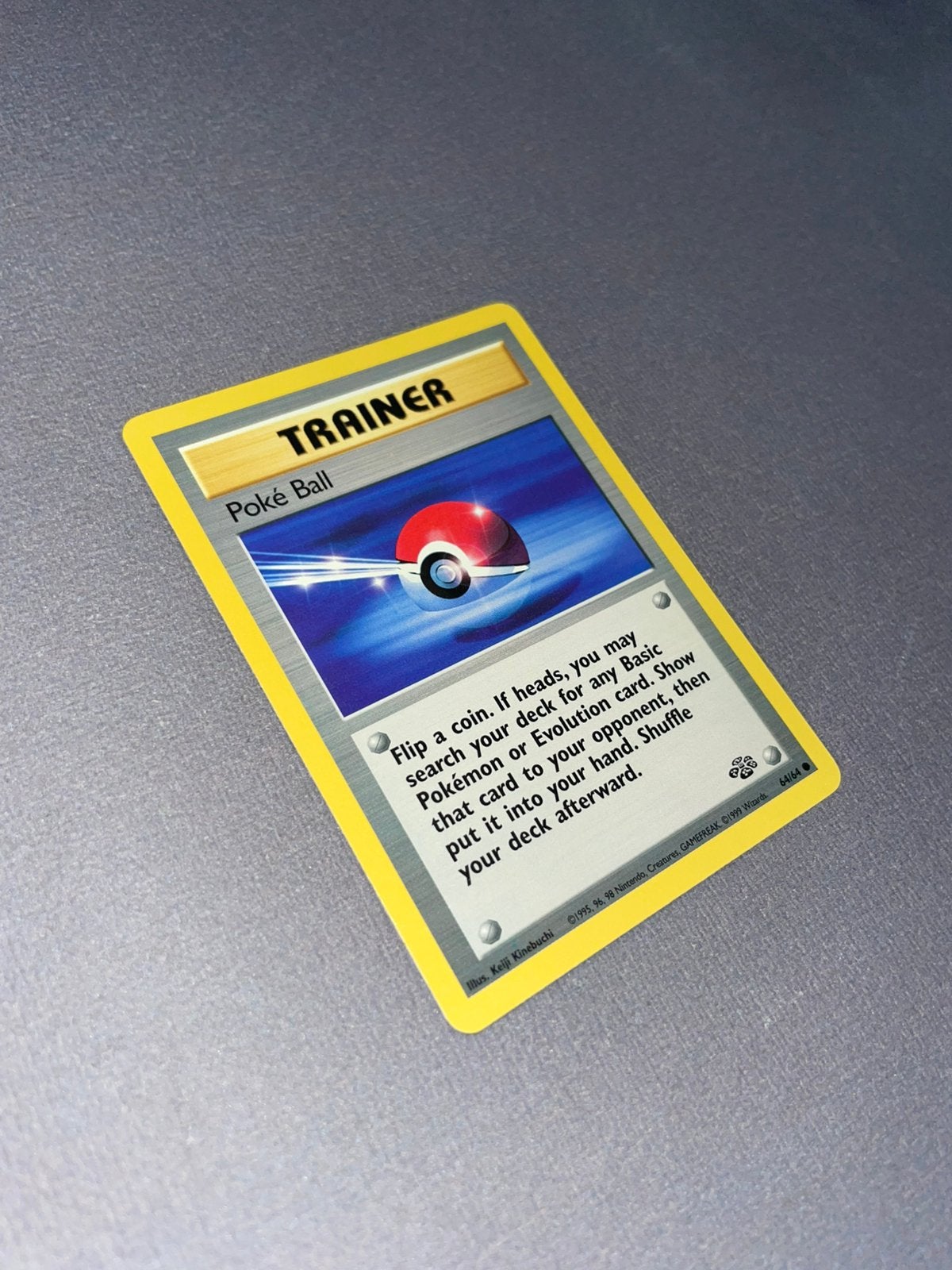 Poke Ball 64/64 Jungle Trainer Pokemon Near Mint, Ophalen of Verzenden, Zo goed als nieuw, Losse kaart