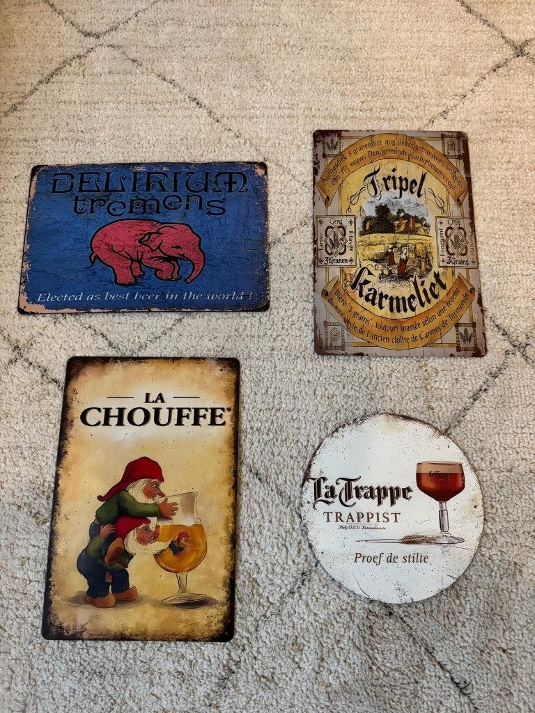4 bordjes speciaal bier / Delirium / La Trappe / Chouffe, Ophalen of Verzenden, Zo goed als nieuw