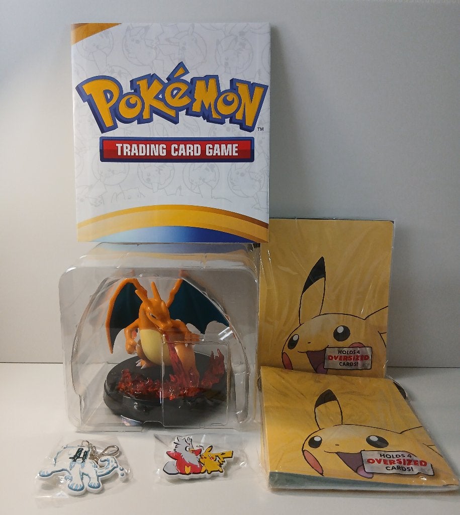 Pokemon set Charizard beeldje Pikachu binders Poster NIEUW, Verzamelen, Verzenden, Nieuw, Overige typen