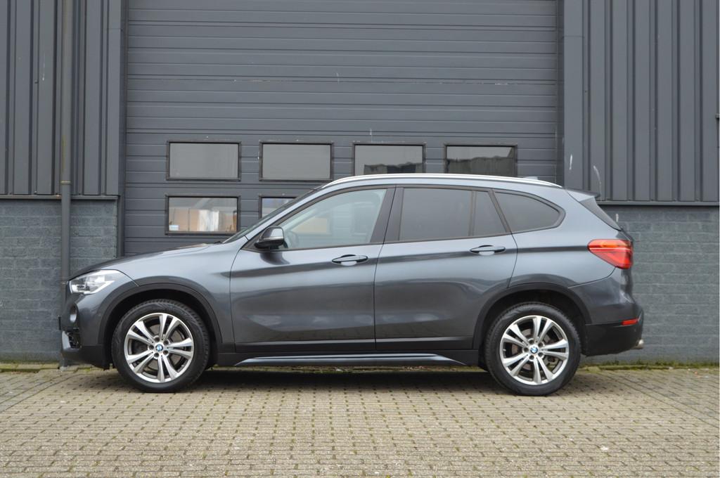 BMW X1 xDrive20i Centennial High Executive | PANO |, Auto's, BMW, 1998 cc, Gebruikt, Leder, Bedrijf