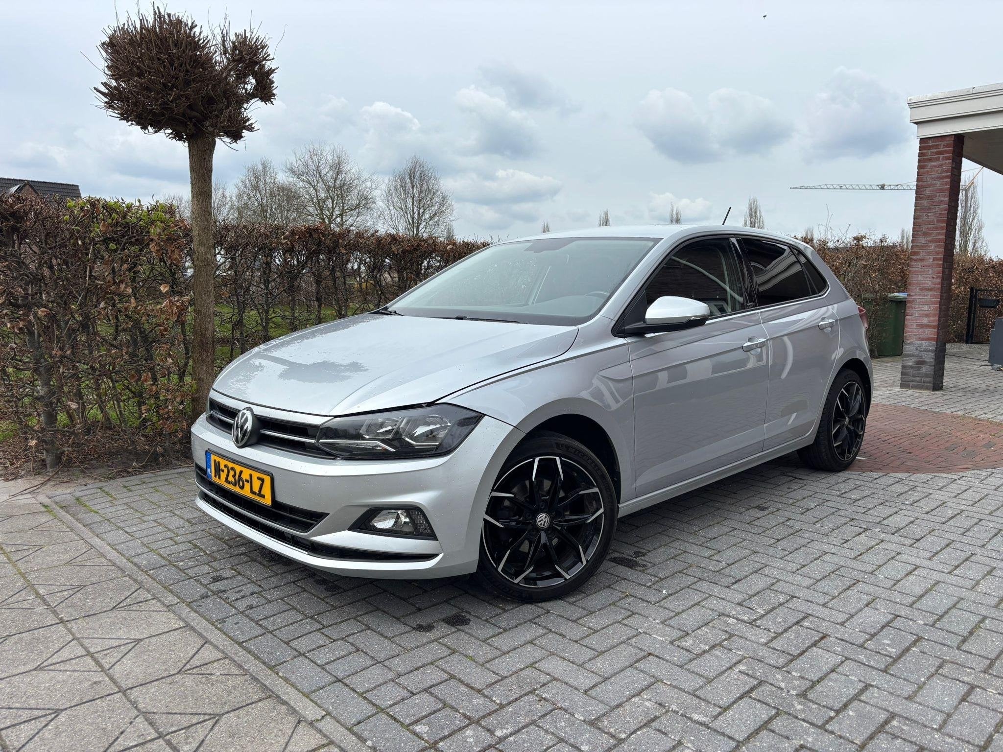Volkswagen Polo 1.0 TSI Highline Business R, Auto's, Stof, Gebruikt, 580 kg, 116 pk