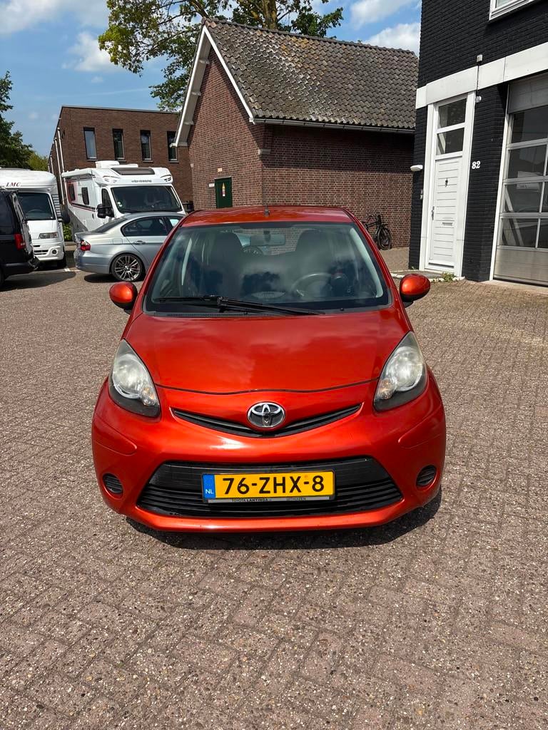 Toyota Aygo 1.0 VVT-i Comfort Orange Centrale Airco, Voorwielaandrijving, Euro 5, Stof, Gebruikt