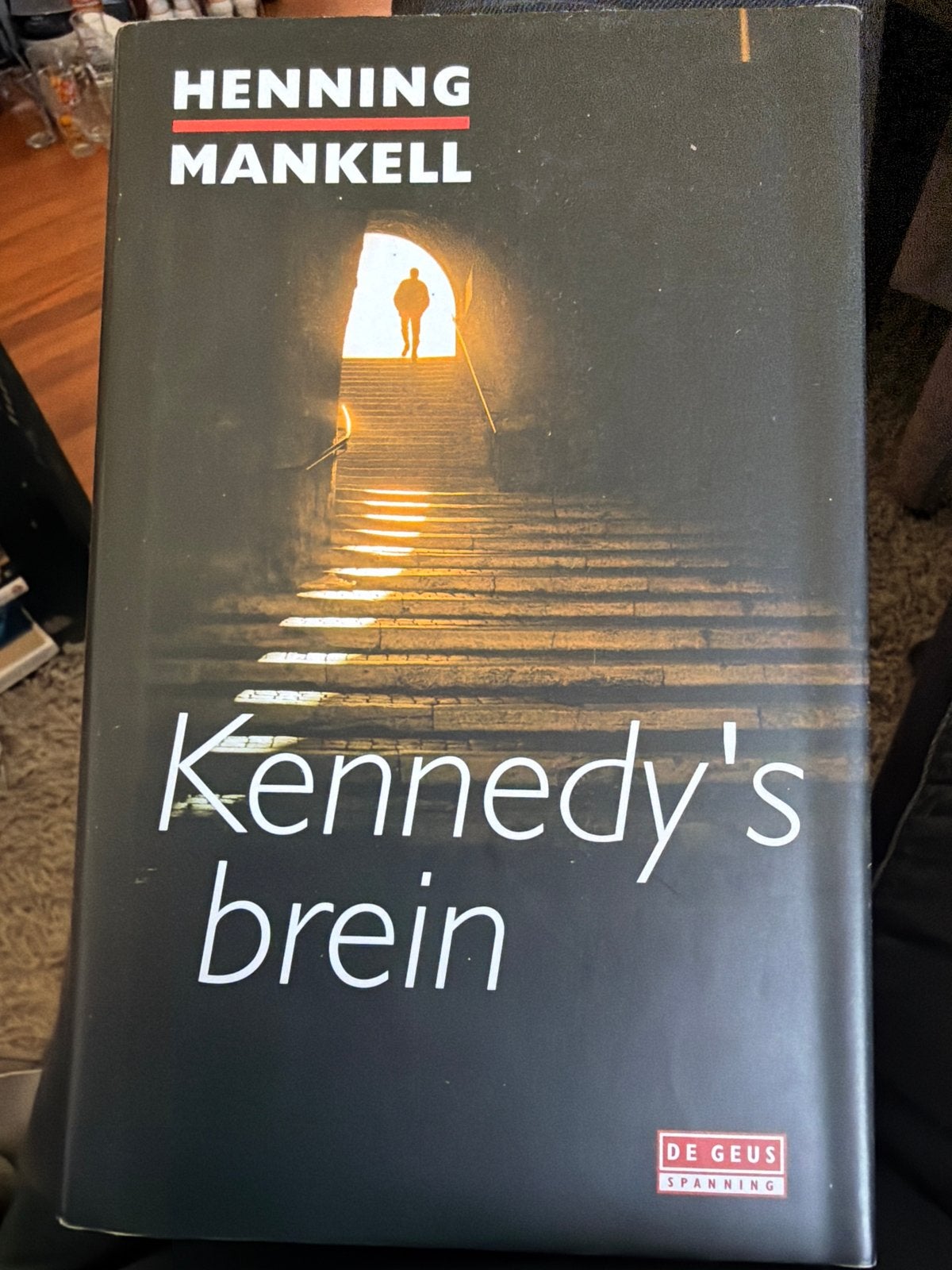 S10.   Henning Mankell - Kennedy's brein, Ophalen of Verzenden, Zo goed als nieuw, Henning Mankell