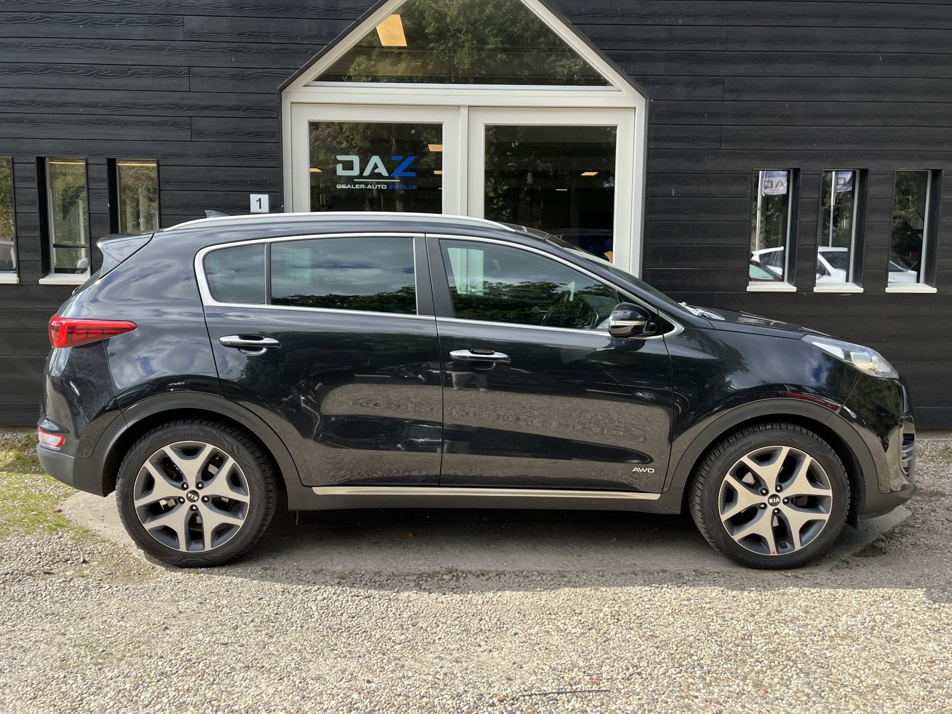 Kia Sportage 1.6 T-GDI 4WD GT-Line Aut/Ecc/Leer/Navi/Pano/Tr, Gebruikt, 4 cilinders, Zwart, Bedrijf