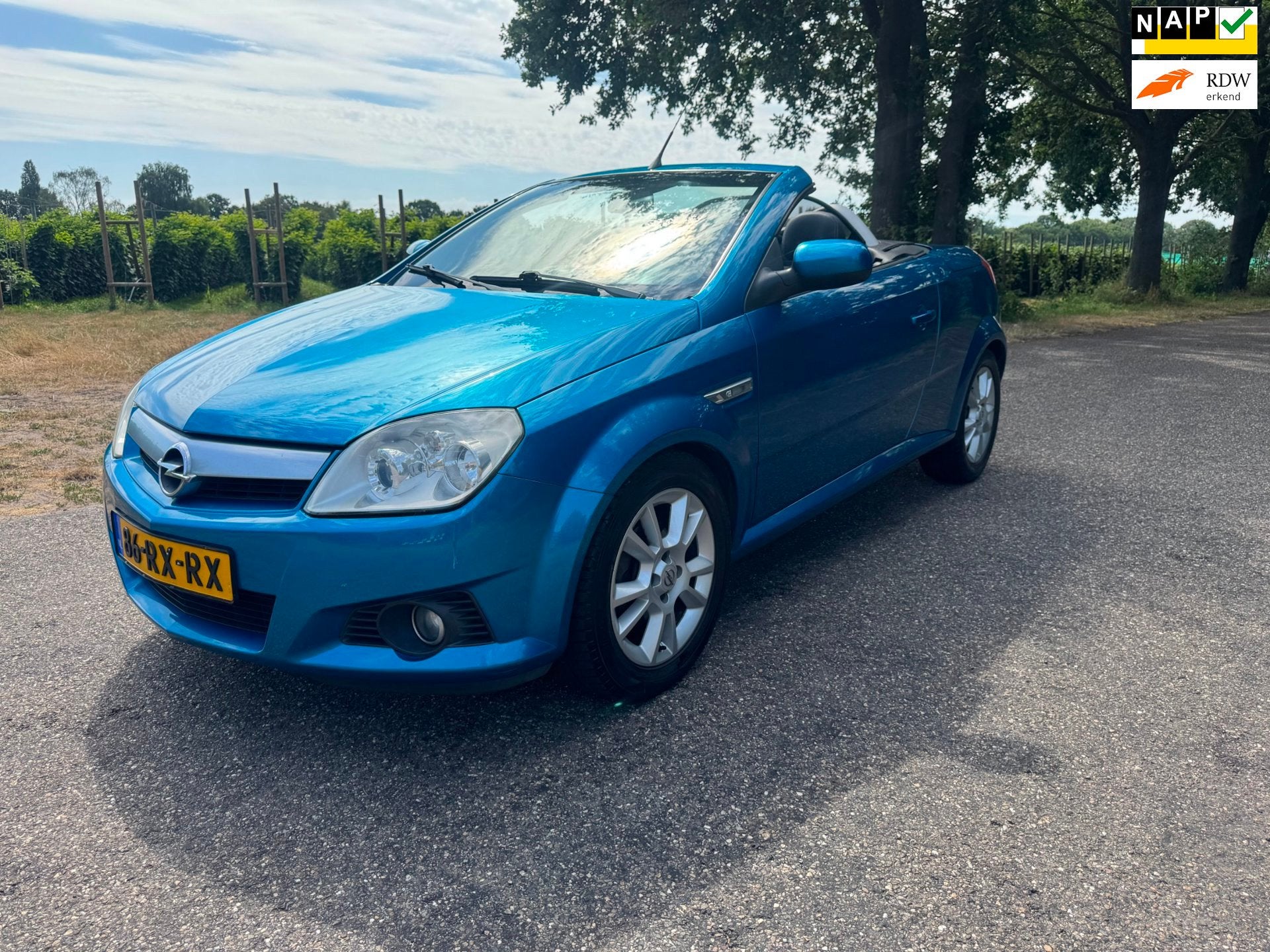 Opel Tigra TwinTop 1.8-16V Linea Rosso | Nette auto, 125 pk, Gebruikt, 4 cilinders, Blauw