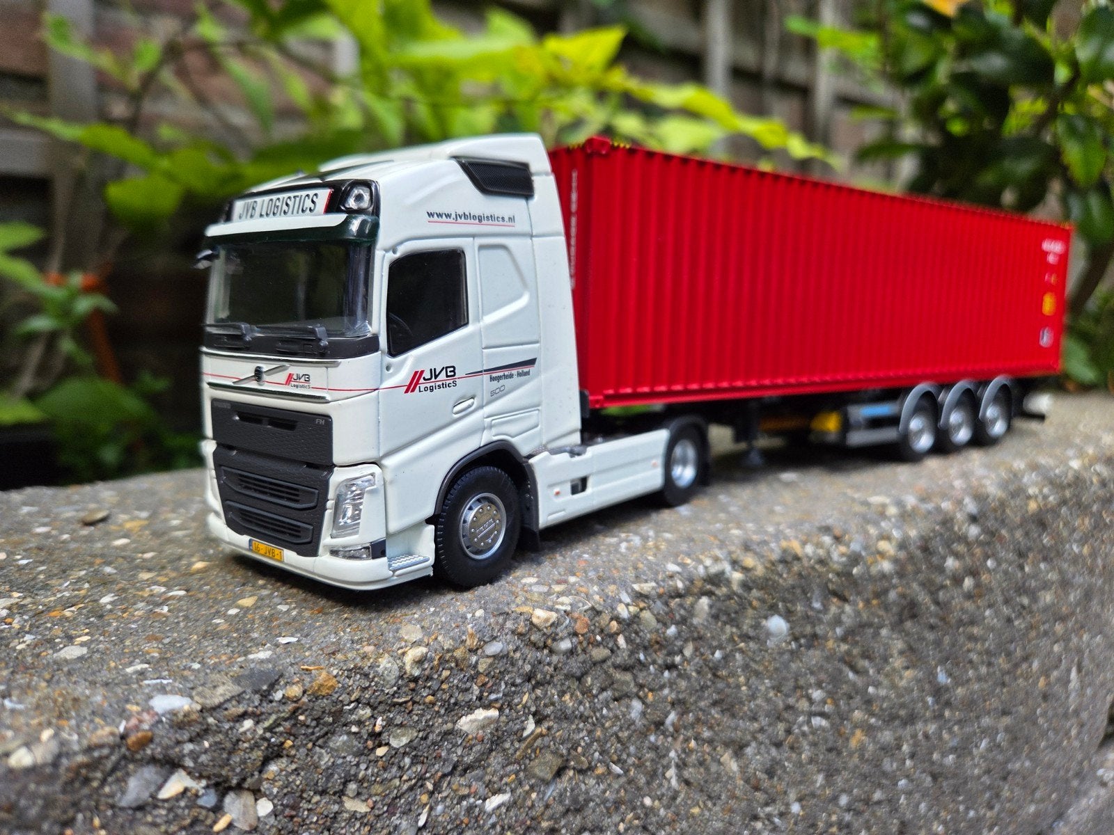 Tekno Volvo JVB logistics met container en oplegger., Ophalen of Verzenden, Nieuw, Bus of Vrachtwagen, Tekno