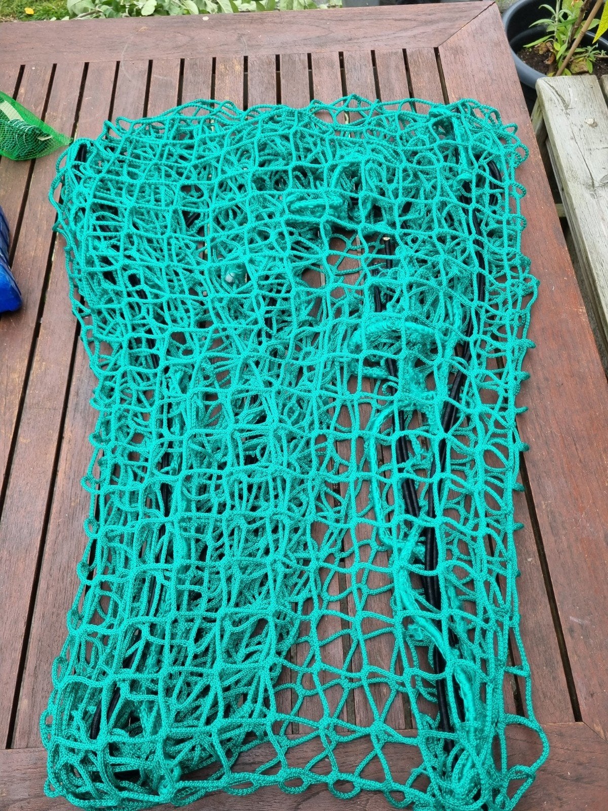 Net voor aanhanger elastisch, Ophalen