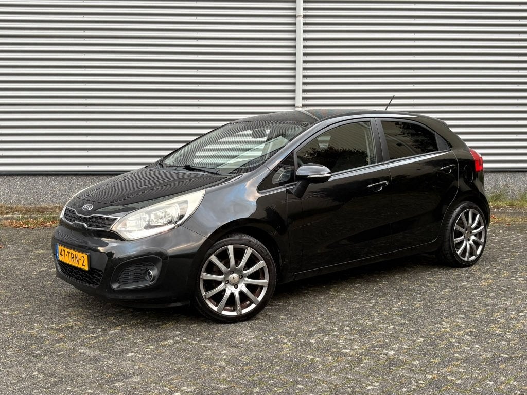 Kia Rio 1.2 CVVT Plus Pack Airco Volledig Onderhoud LED APK, Auto's, 21 km/l, Euro 5, Zwart, 4 cilinders