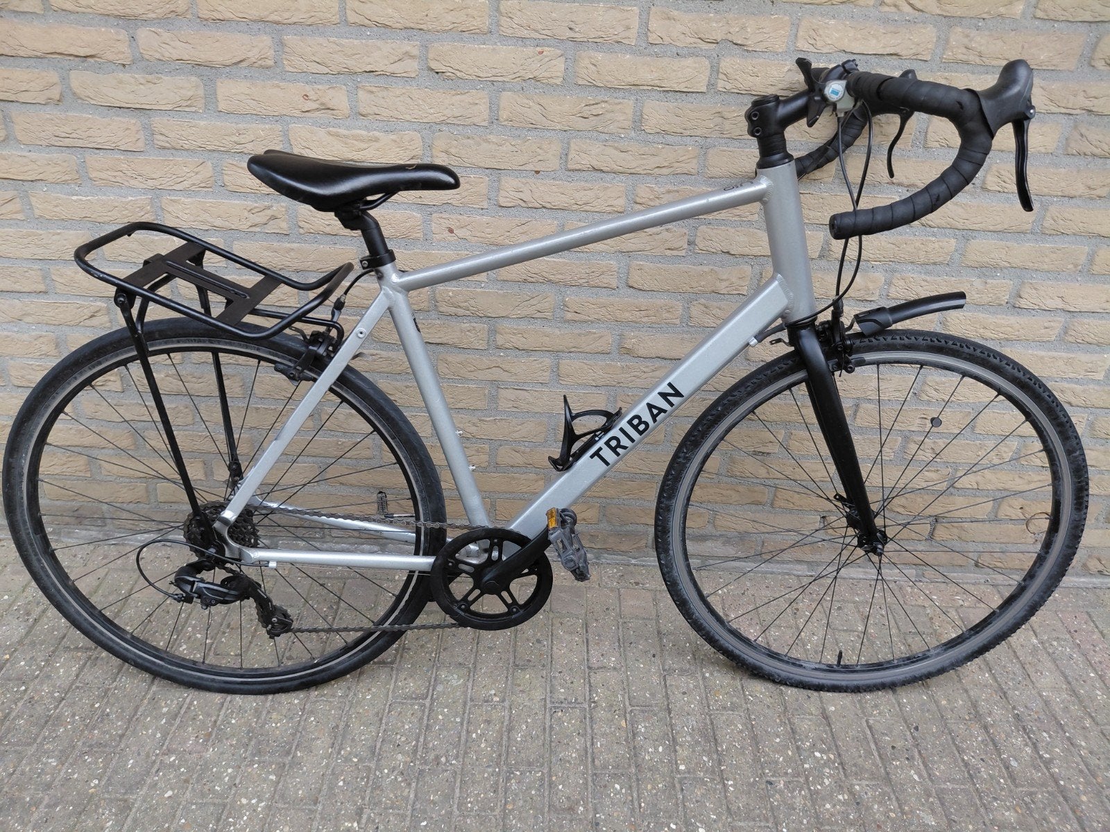 een zo goed als nieuwe triban racefiets, Fietsen en Brommers, Velgrem, Zo goed als nieuw, 61 tot 65 cm, Ophalen