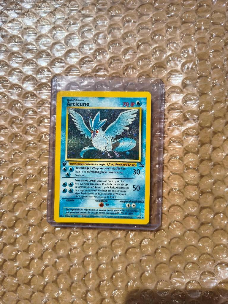 Pokemon Articuno Nederlands Fossil 1st edition, Ophalen of Verzenden, Zo goed als nieuw