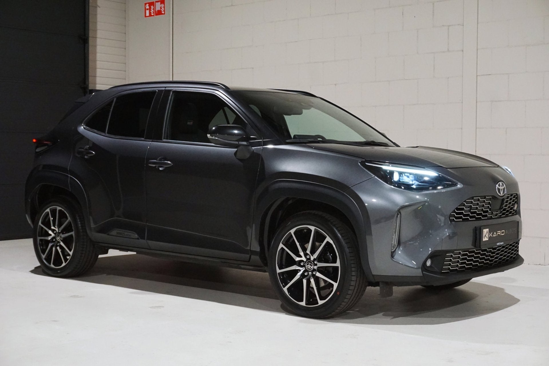 Toyota Yaris Cross 1.5 Hybrid GR Sport Pano HUD JBL Cam VOL, Stof, Gebruikt, 1490 cc, 93 pk