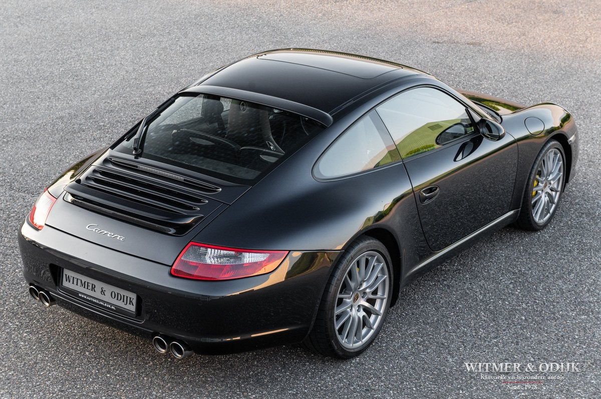 Porsche 911 Carrera Nieuw PCCM (bj 2004, automaat), Auto's, Dealer onderhouden, Achterwielaandrijving, Gebruikt, Zwart