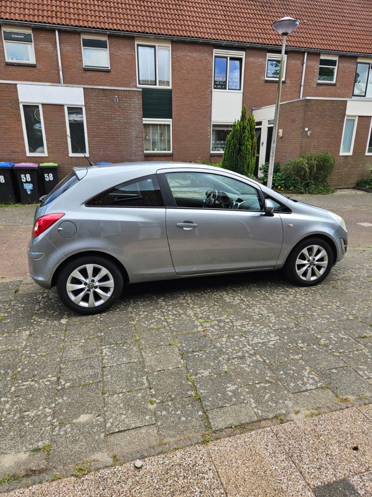 Opel Corsa 1.2 16V ✅️1e eigenaar nw apk LPG 3D 2012 Grijs, Voorwielaandrijving, 83 pk, 4 cilinders, 1229 cc