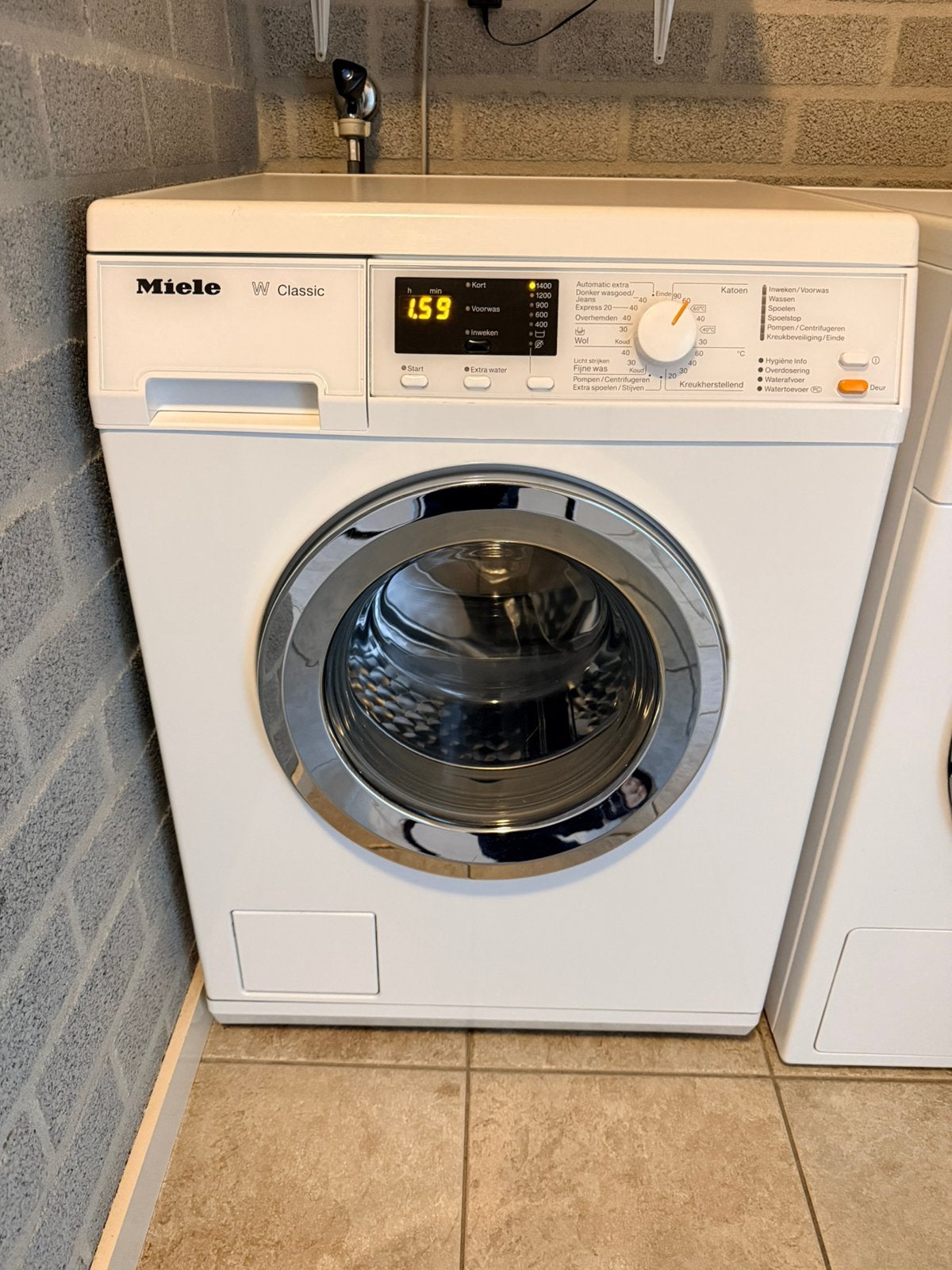 Foto 2 van *Miele W Classic WDA110*