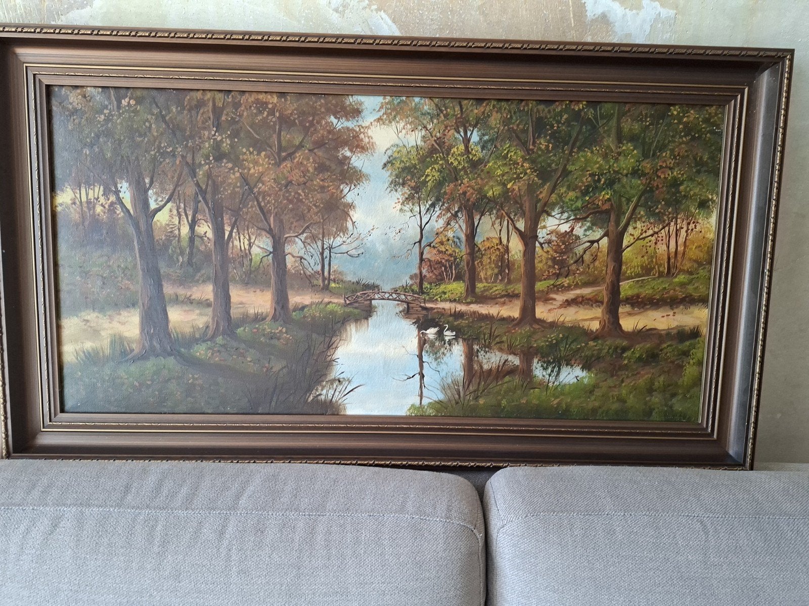 Schilderij: Herfstlandschap met rivier en brug, Ophalen