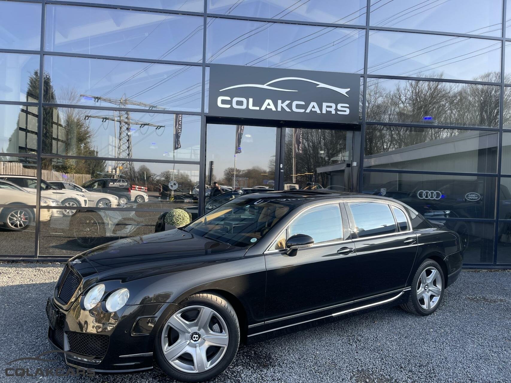 Bentley Continental 6.0 W12 Mansory Garantie nieuw !, Auto's, Bentley, Gebruikt, 12 cilinders, Zwart, Leder