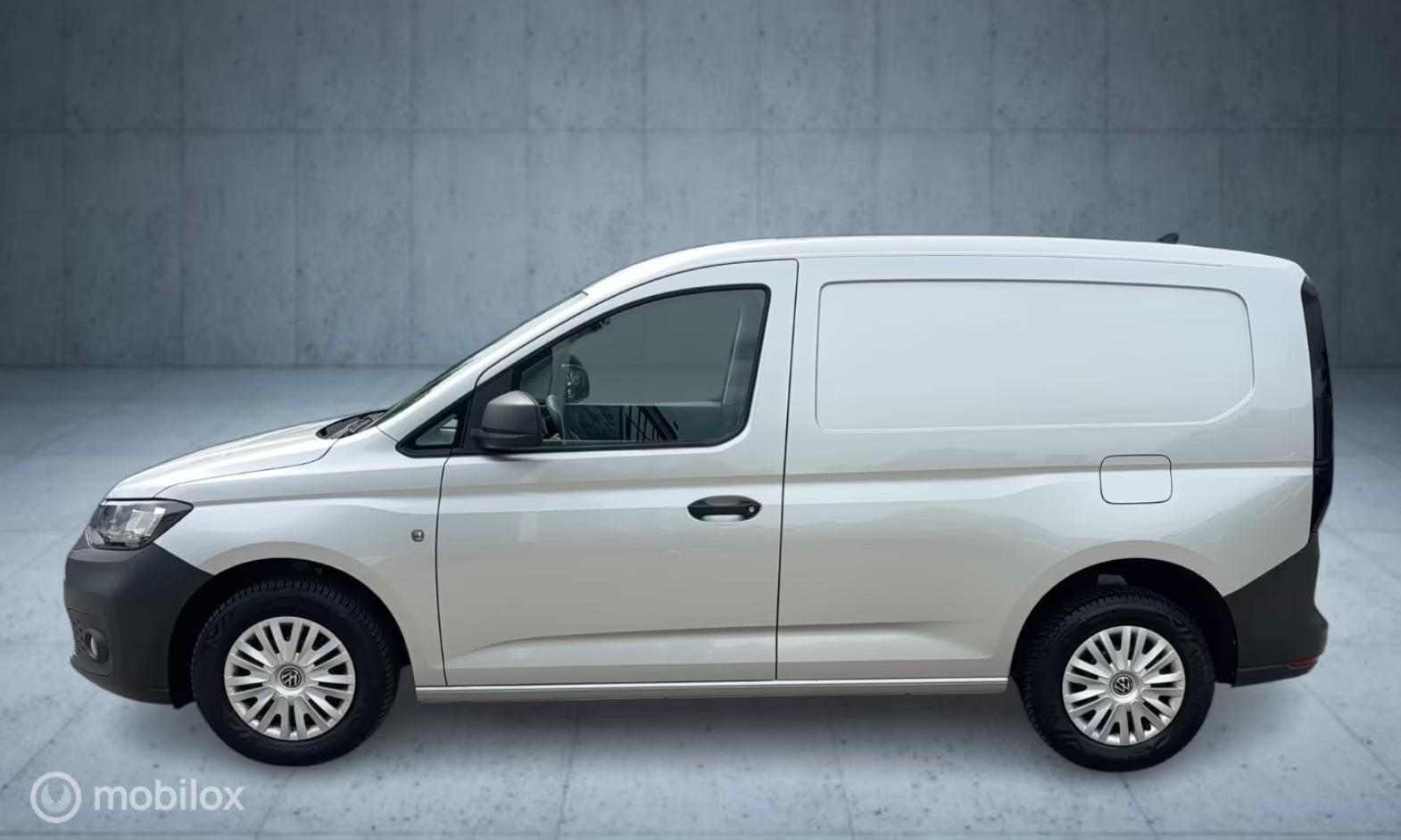 Volkswagen Caddy Cargo 2.0 TDI Comfort I 102 pk I Camera I, Auto's, Gebruikt, Zwart, 4 cilinders, Met garantie (alle)