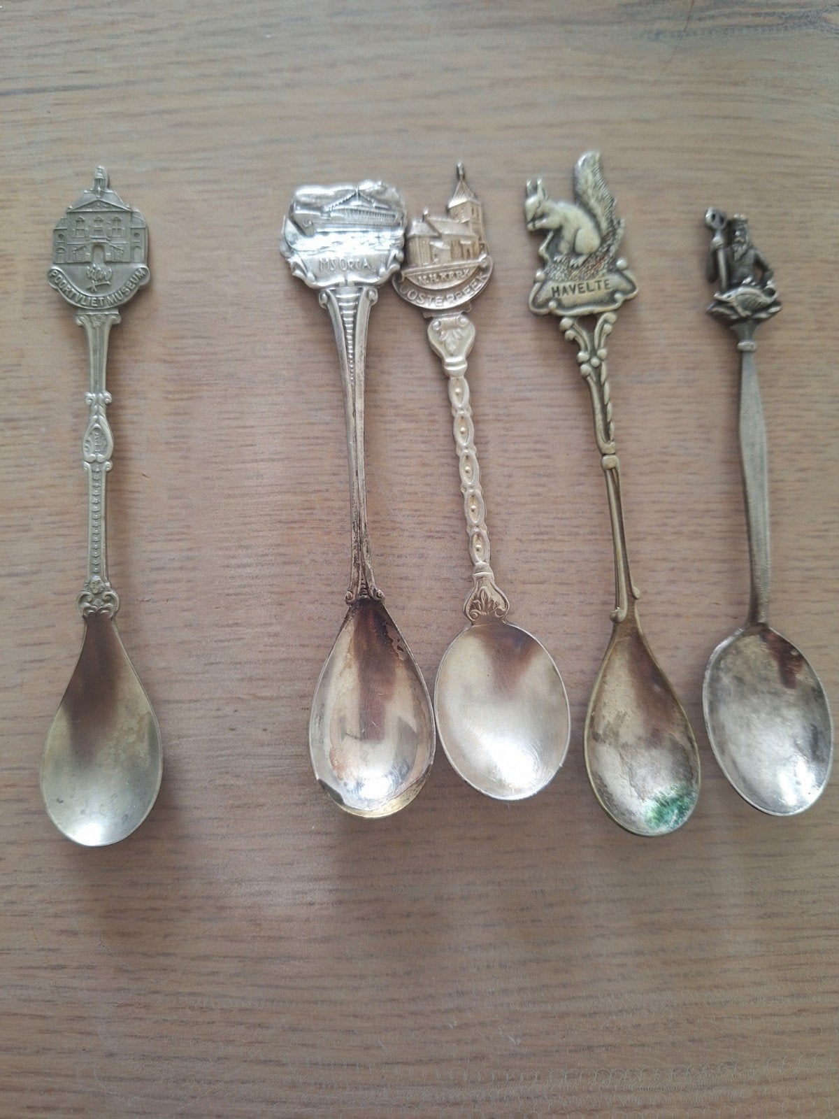 Set van 4 verzilverde theelepels met diverse afbeeldingen, Ophalen of Verzenden