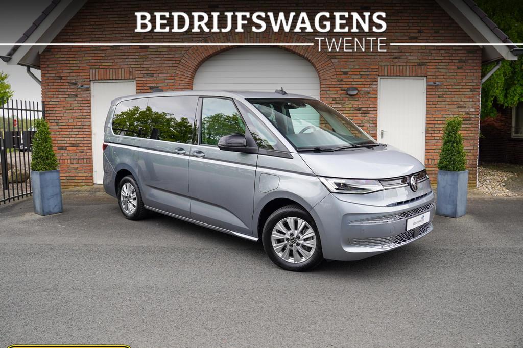 Volkswagen Multivan 1.4 E-hybrid Life L2 218PK Panoramadak A, Auto's, Stof, Gebruikt, Euro 6, 138 €/maand