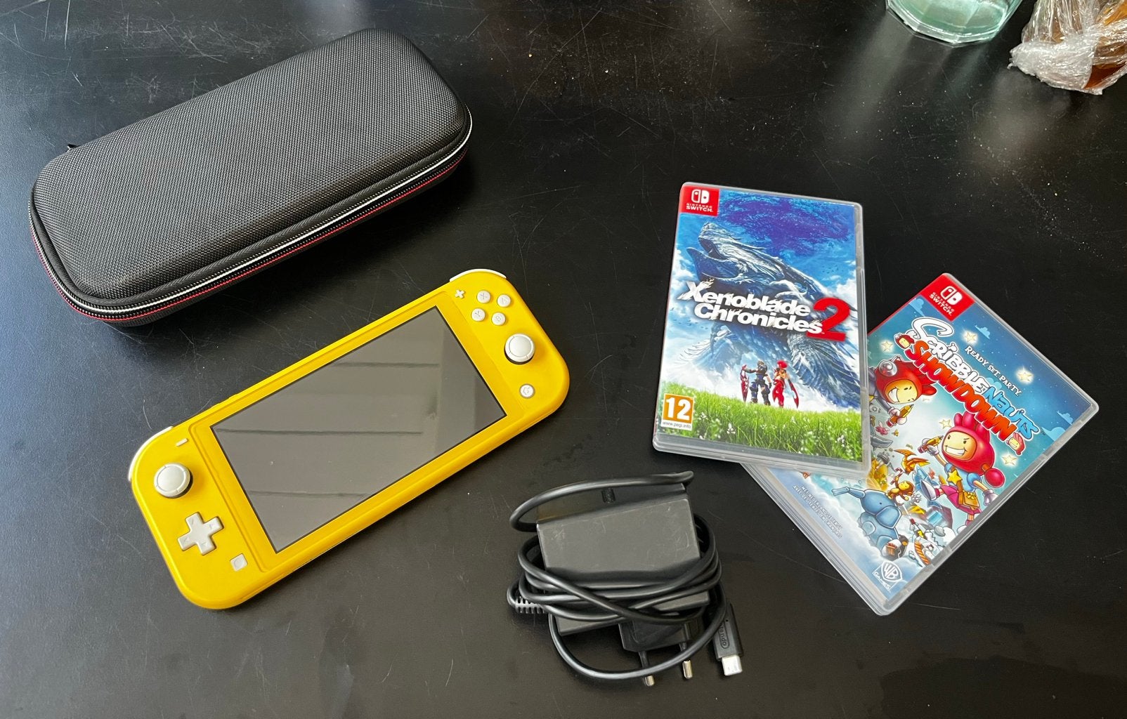 Nintendo switch lite + 2 games compleet, Spelcomputers en Games, Games | Nintendo Switch, 1 speler, Verzenden, Zo goed als nieuw