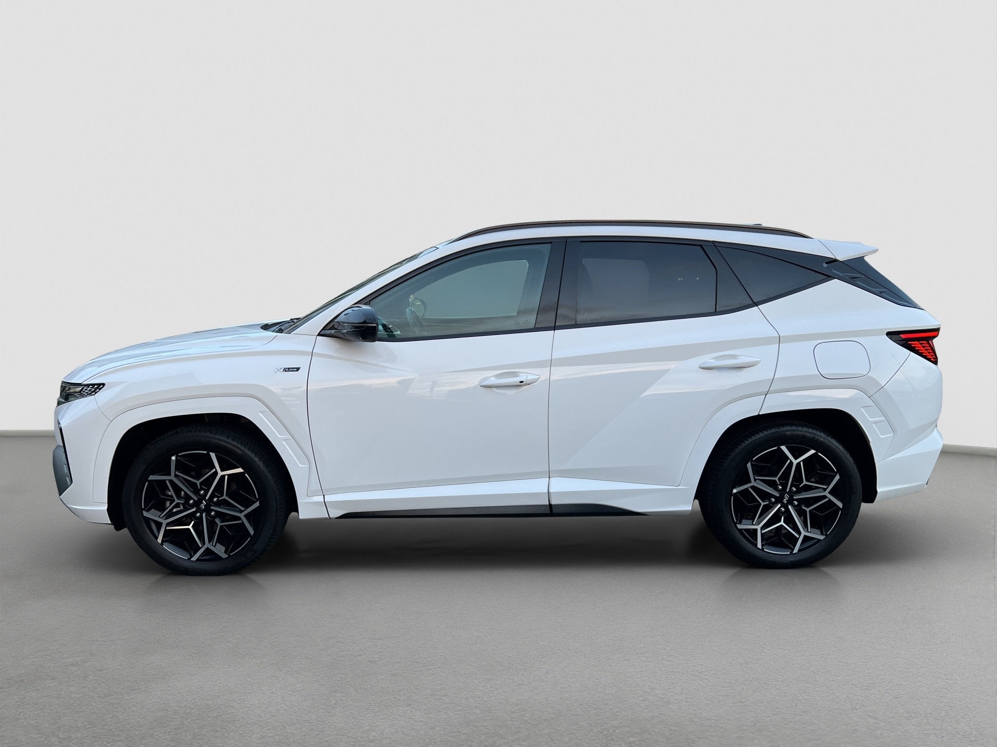 Hyundai Tucson 1.6 T-GDI 265pk PHEV N-Line 4WD, Auto's, Gebruikt, 4 cilinders, Wit, Vierwielaandrijving