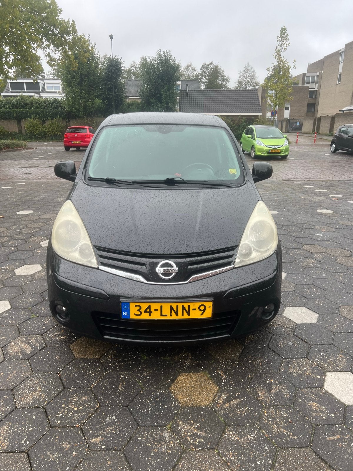 Nissan Note 1.4 16V 2010 Zwart, Auto's, Voorwielaandrijving, 4 cilinders, Origineel Nederlands, Particulier