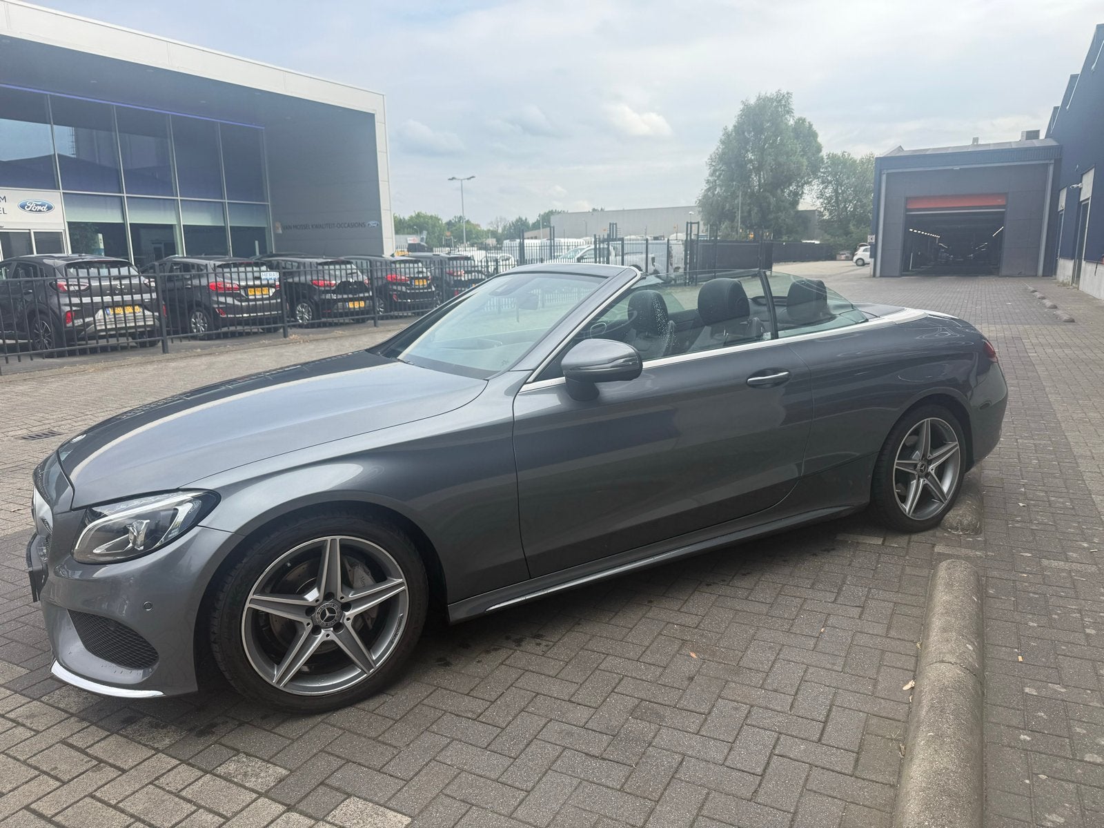 Mercedes-Benz C-Klasse C180 AMG 156pk 9G-TRONIC 2017 Grijs, 1800 kg, Zwart, Cabriolet, 1595 cc