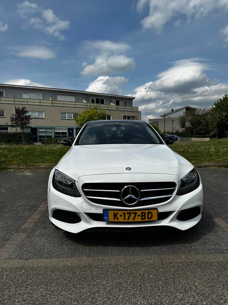 Mercedes-Benz C-Klasse C180 Prestige 1.6 115KW Aut7 2015 Wit, Automaat, 1800 kg, Wit, 1595 cc